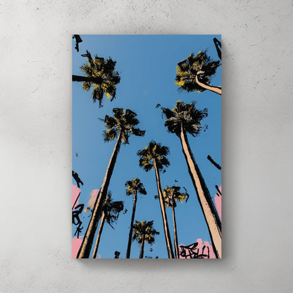 graffiti-style palm trees wall art against blue sky