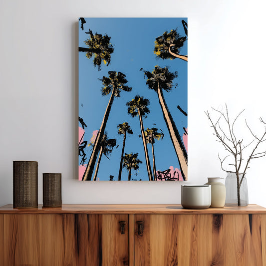 graffiti-style palm trees wall art against blue sky