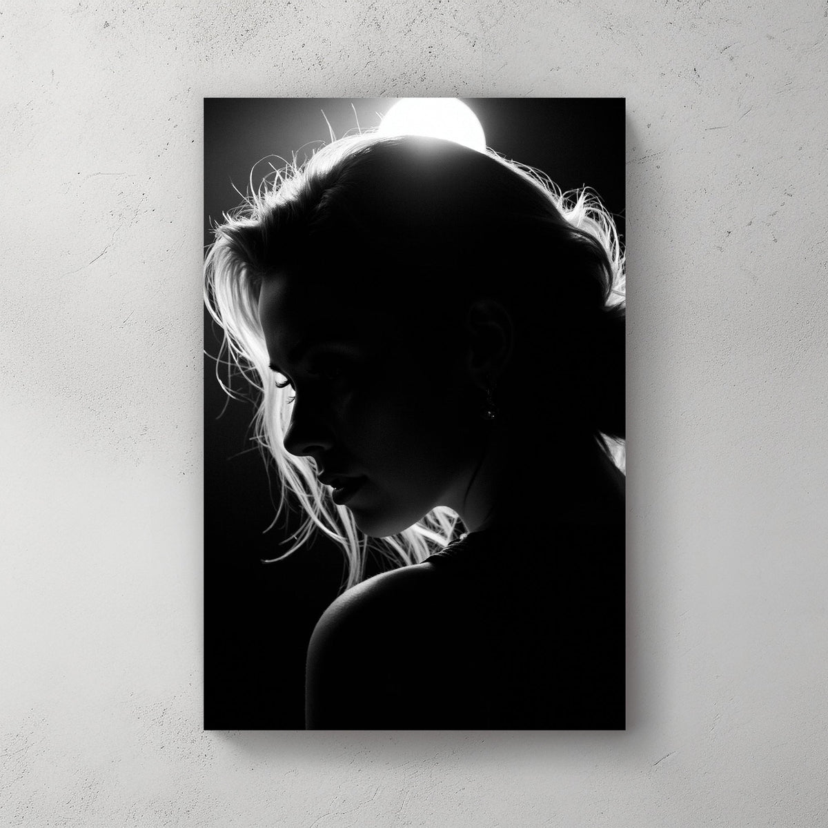 black and white silhouette woman under soft light wall art