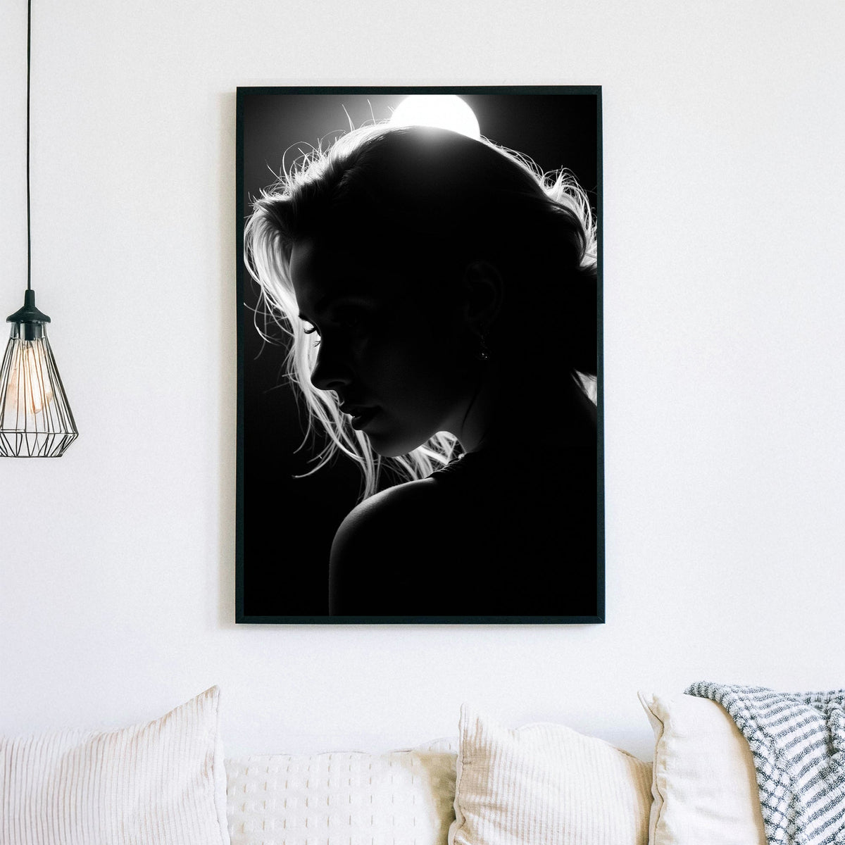 black and white silhouette woman under soft light wall art