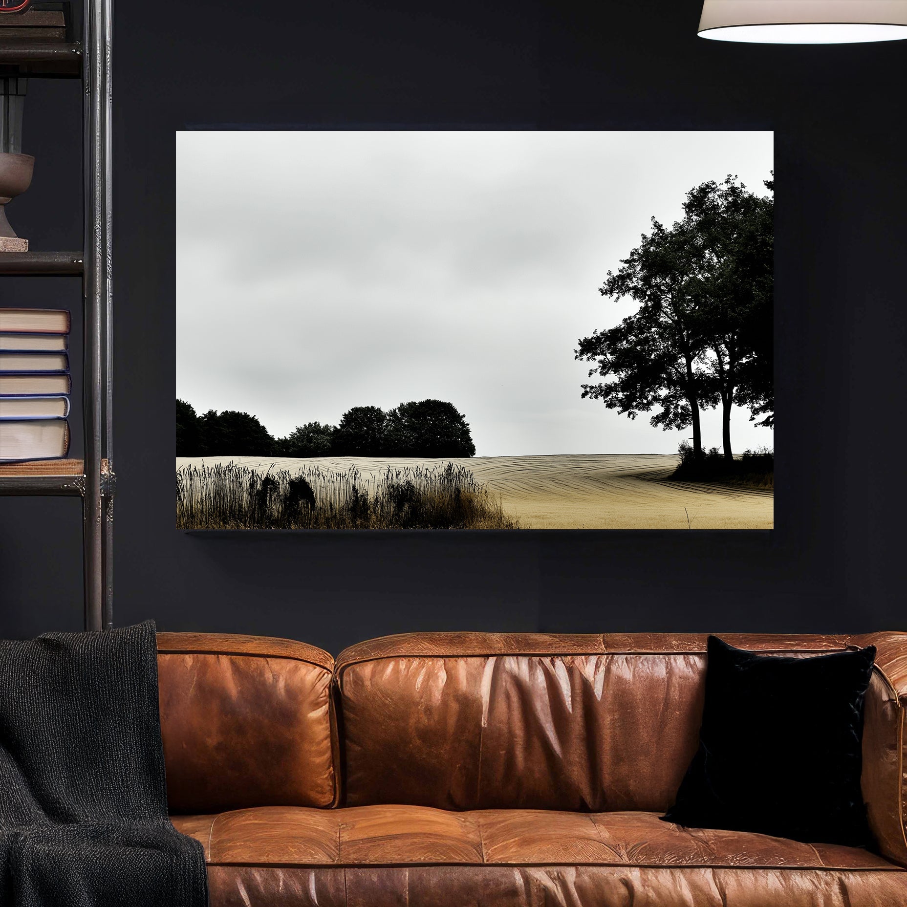 moody rural landscape with trees and curved farmland under grey sky wall art