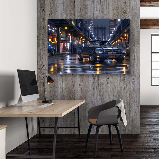 Modern office setup with a desk, chair, and computer monitor, featuring a large wall art of Shelby Mustang on a city street.