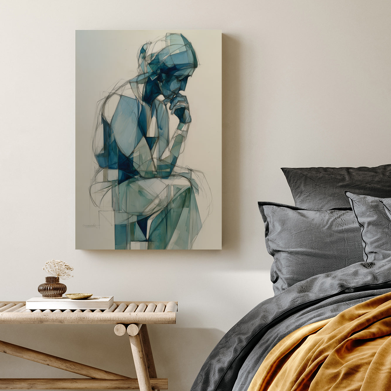 blue geometric figure wall art of person in deep thought