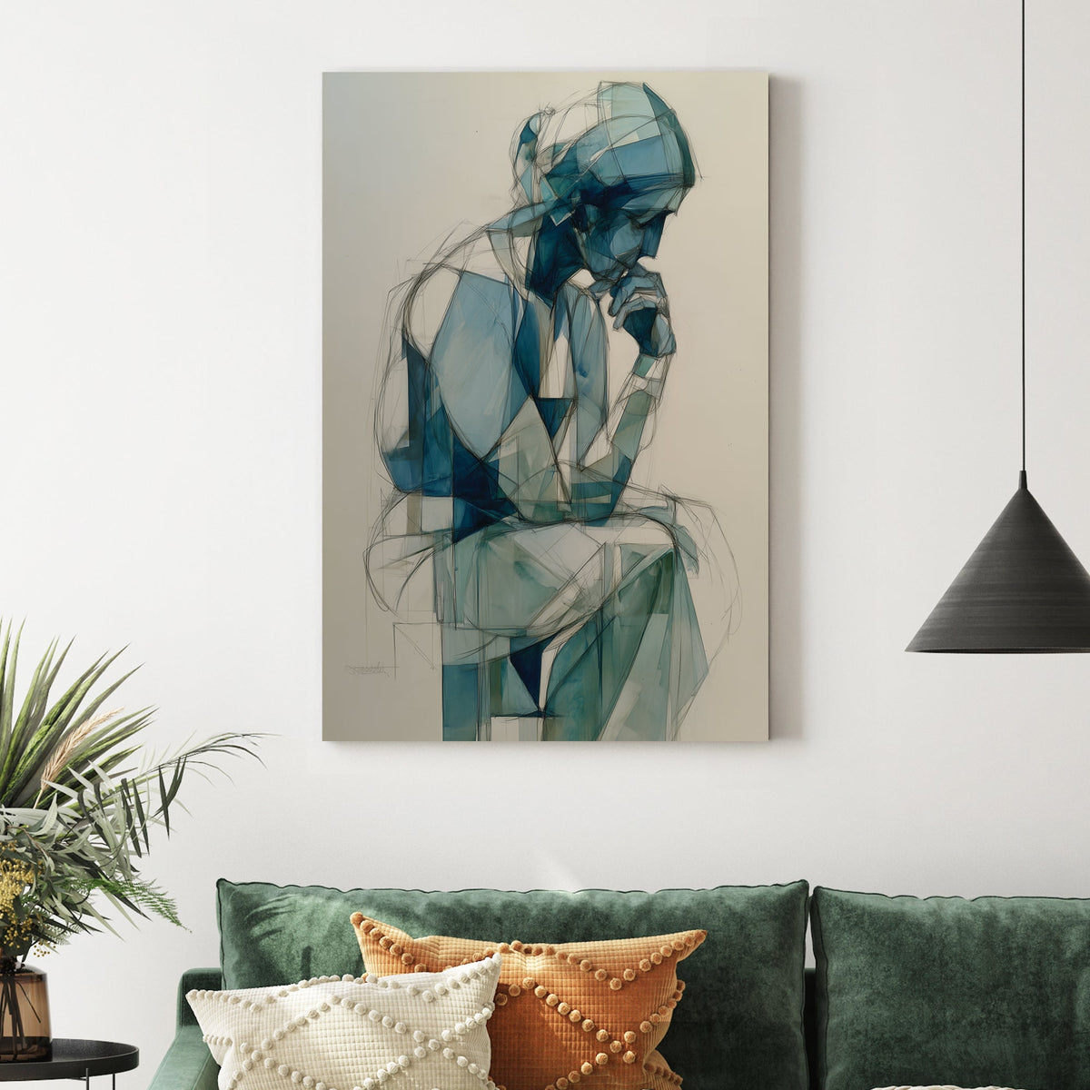 blue geometric figure wall art of person in deep thought