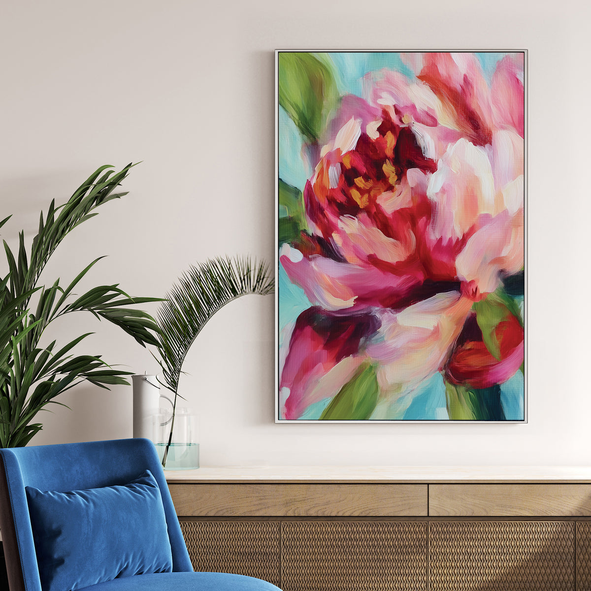 vibrant floral wall art with abstract pink and red petals on blue background