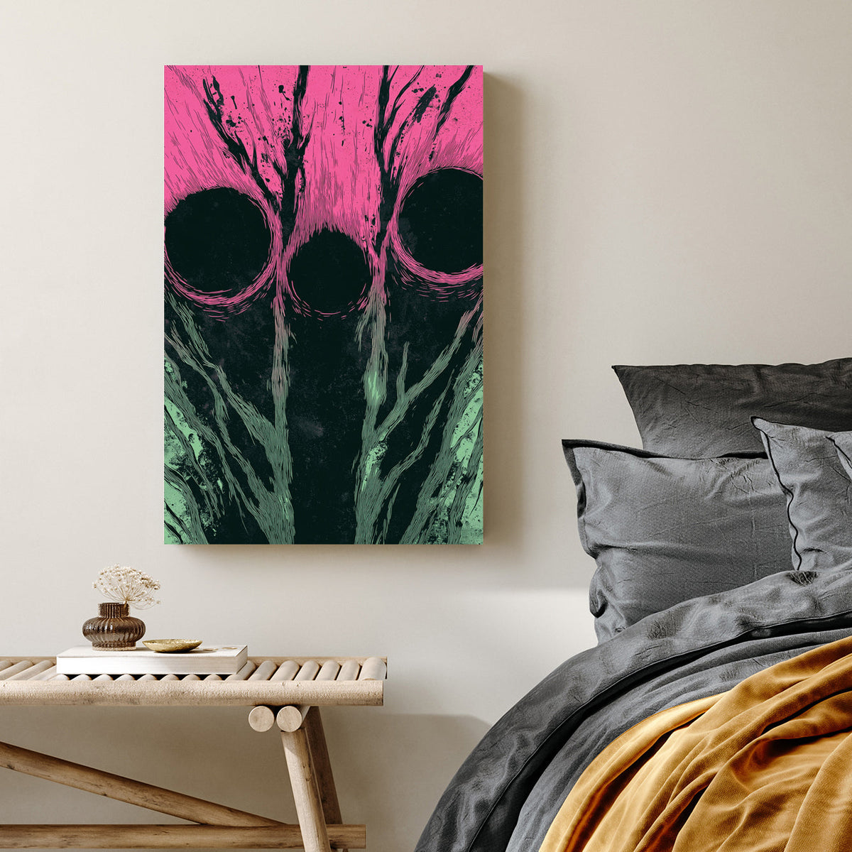 Abstract wall art with three dark circles over pink and green textured background