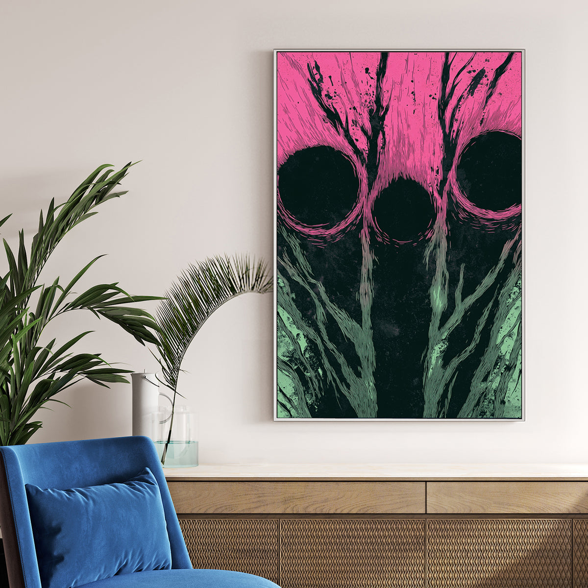Abstract wall art with three dark circles over pink and green textured background