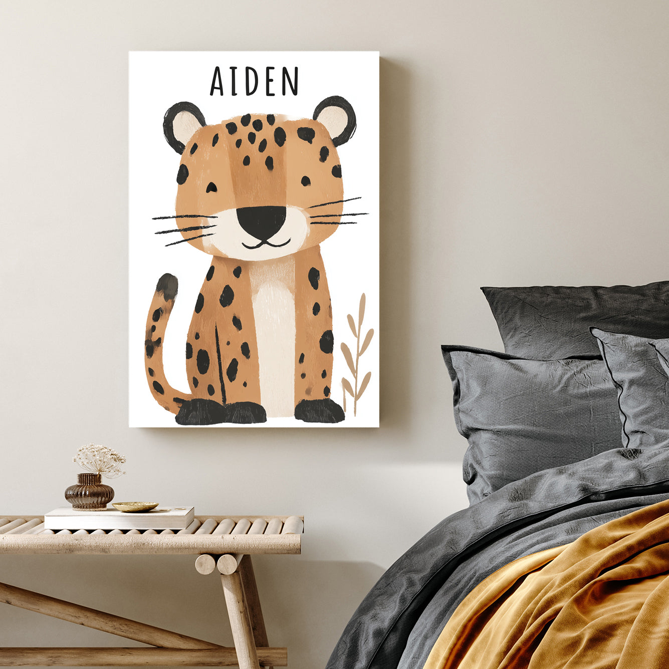 Cute leopard nursery wall art with the name Aiden in soft cartoon style