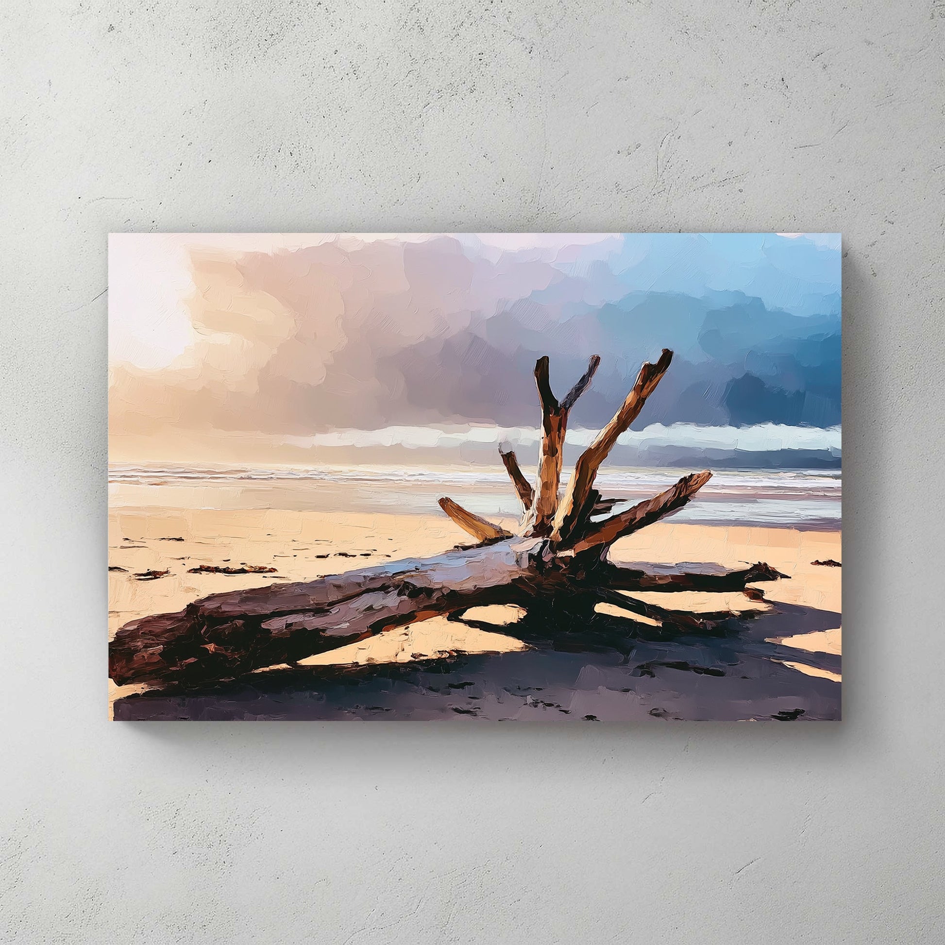 driftwood on beach at sunset wall art with stormy sky and ocean background