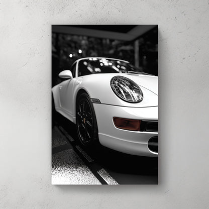 black and white Porsche wall art with dramatic showroom lighting