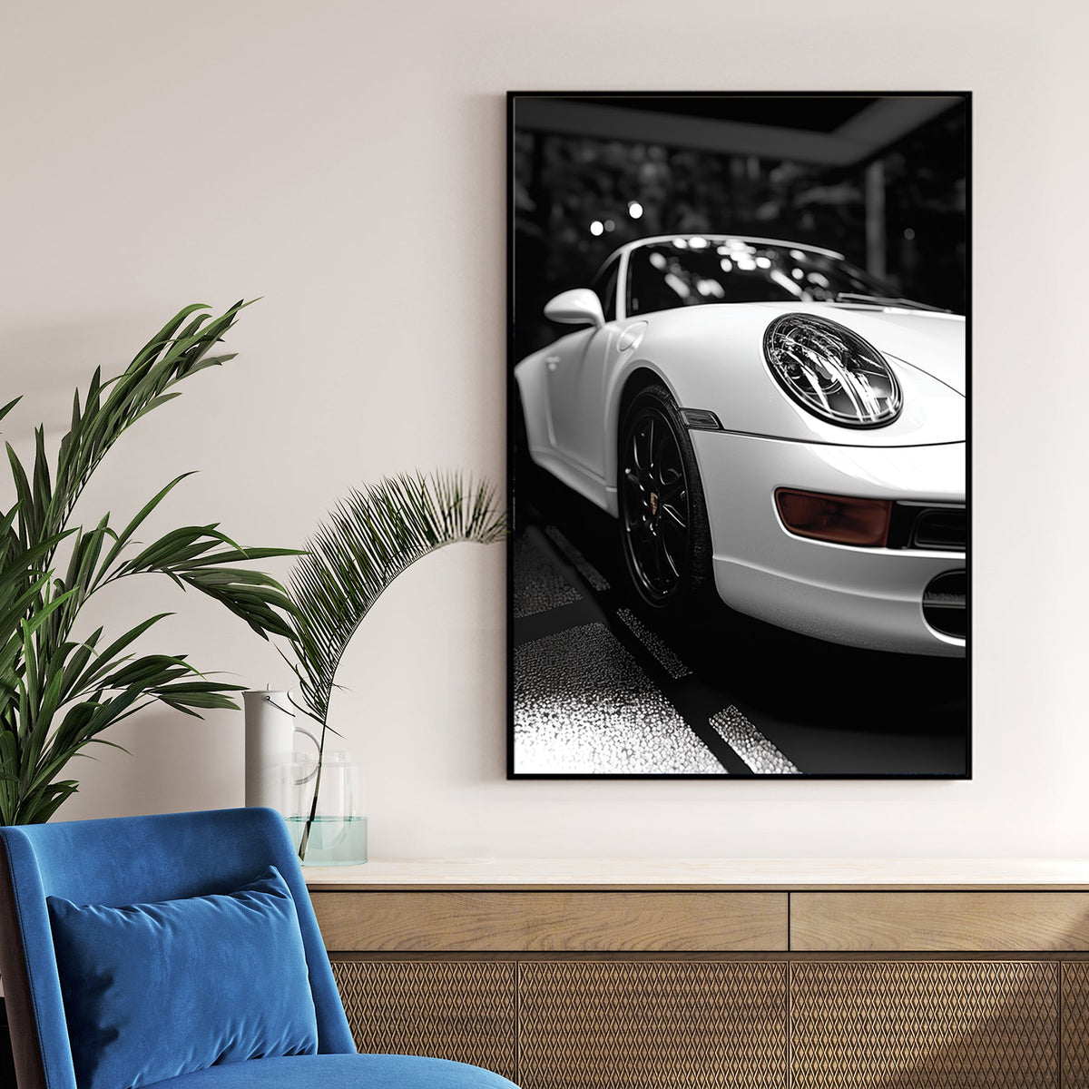 black and white Porsche wall art with dramatic showroom lighting