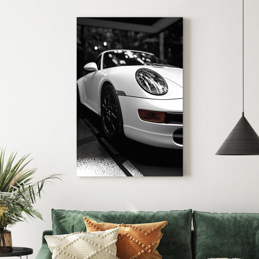 black and white Porsche wall art with dramatic showroom lighting
