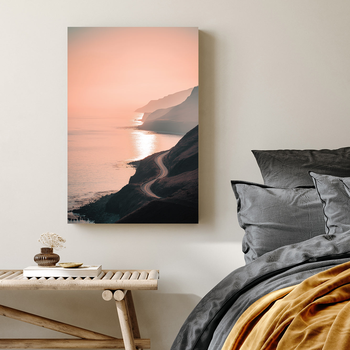 coastal road winding along ocean cliffs at sunset