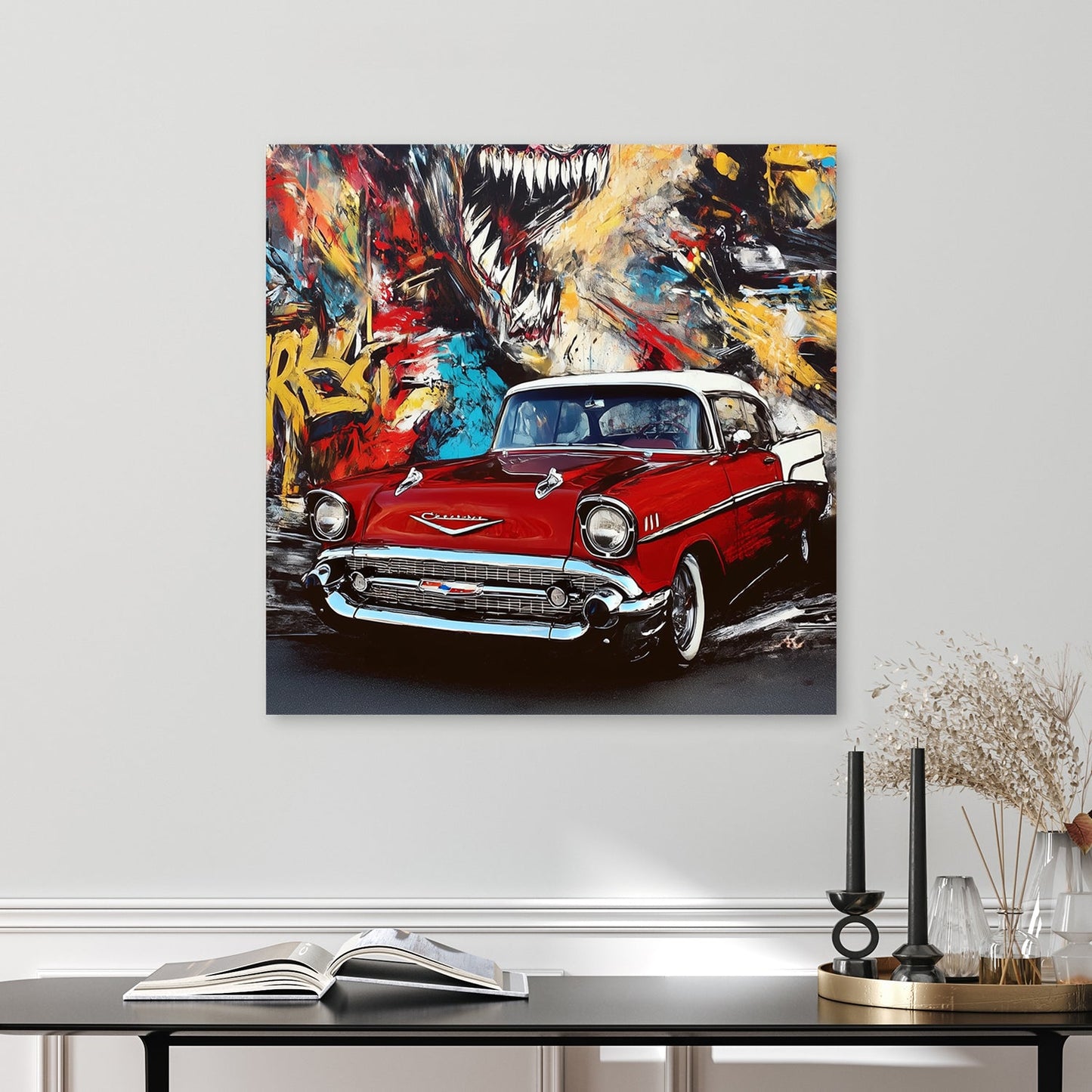 red vintage chevy in front of colourful graffiti mural with roaring creature
