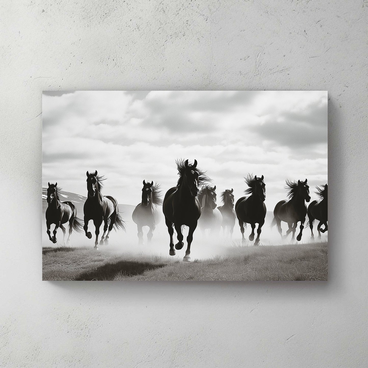black and white wall art of wild horses running in mist