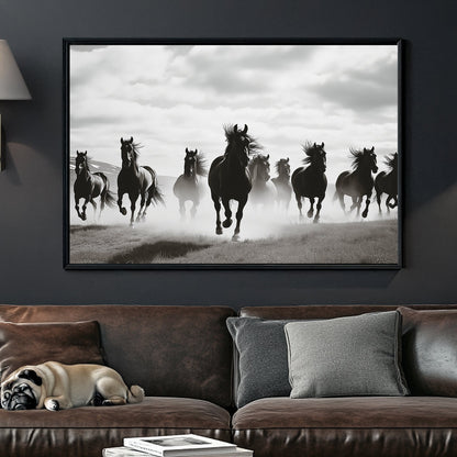 black and white wall art of wild horses running in mist