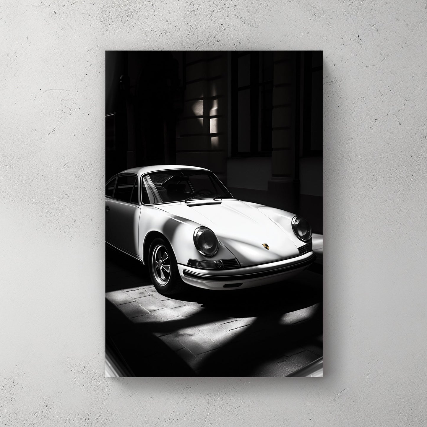 vintage porsche 911 wall art in black and white with dramatic lighting