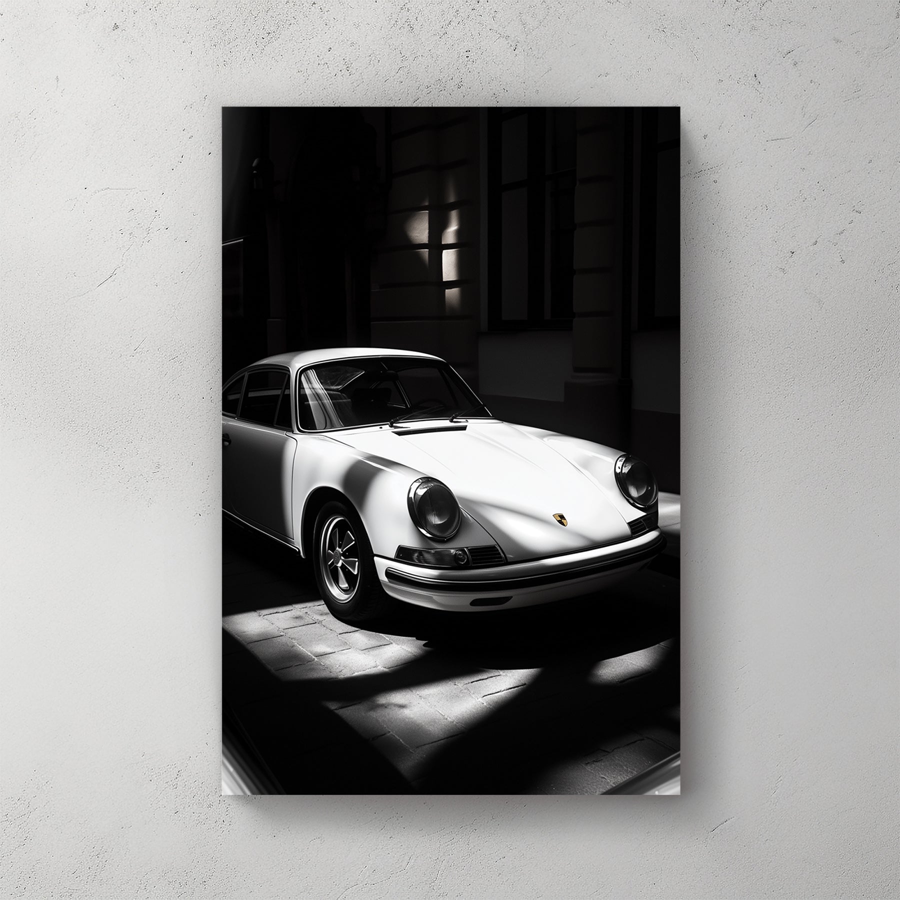 vintage porsche 911 wall art in black and white with dramatic lighting