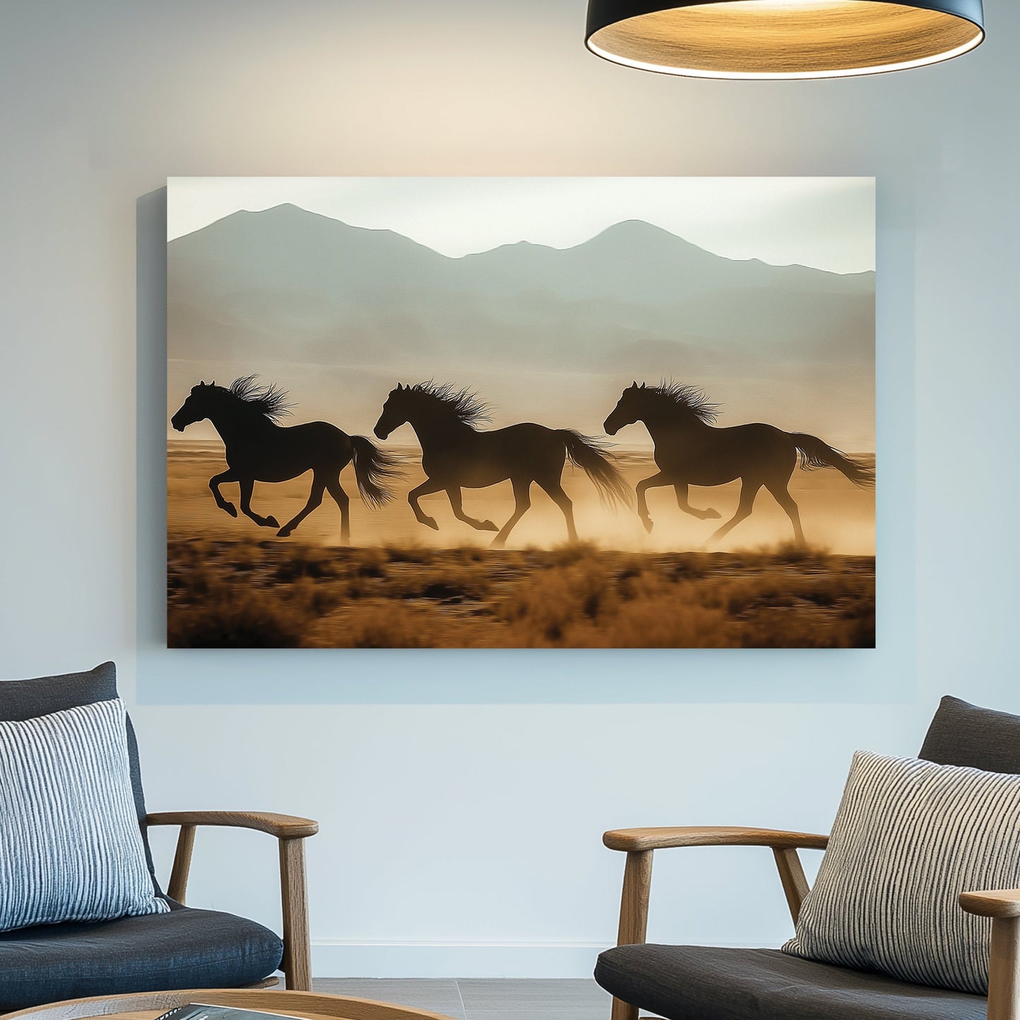 three horses running in desert with mountain background wall art