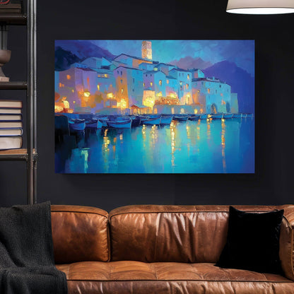dreamy mediterranean village at night wall art with glowing reflections on water