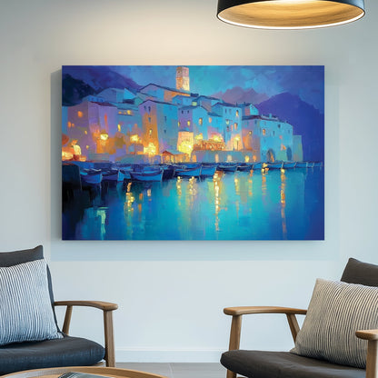 dreamy mediterranean village at night wall art with glowing reflections on water