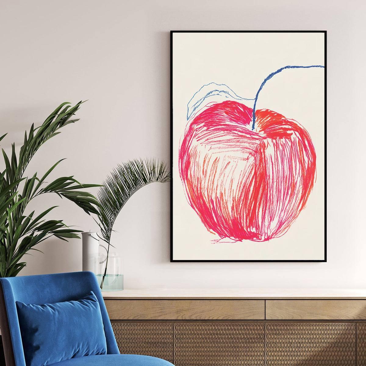 hand-drawn apple sketch wall art with red and blue crayon lines
