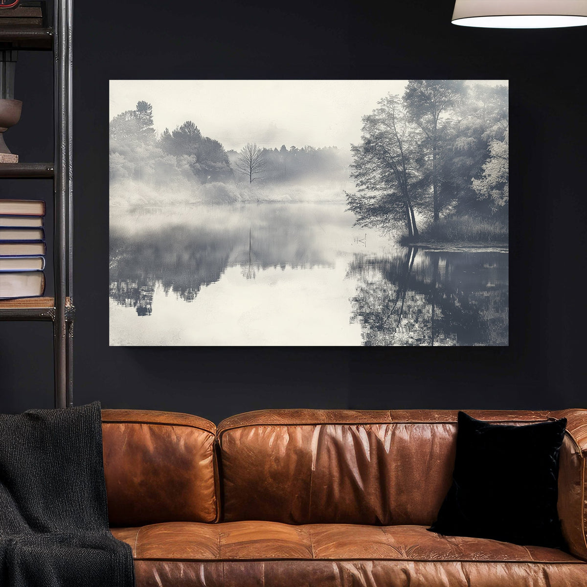 black and white landscape of foggy lake with trees reflected in still water