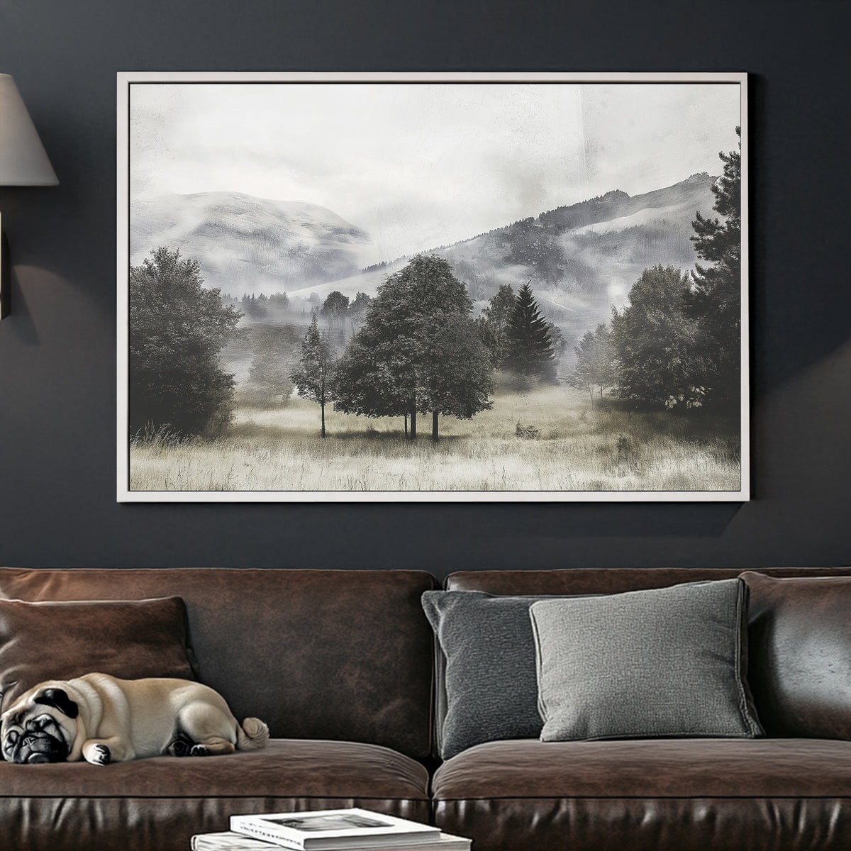 black and white landscape of foggy trees and distant hills in open meadow