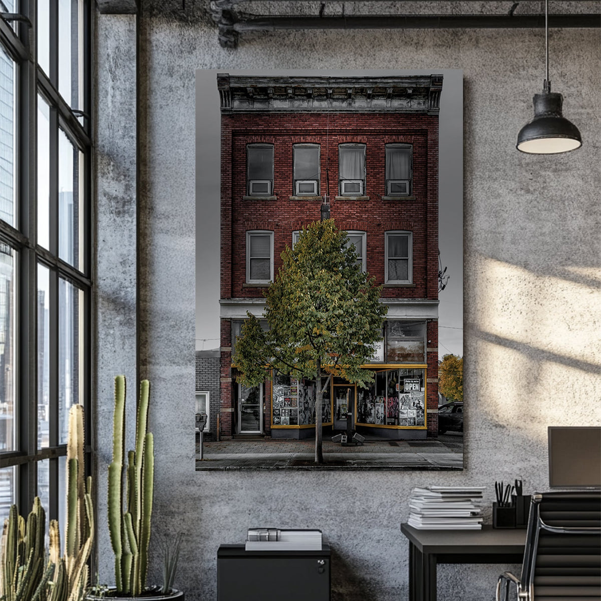 Vintage red-brick storefront with urban posters and single tree, moody sky backdrop