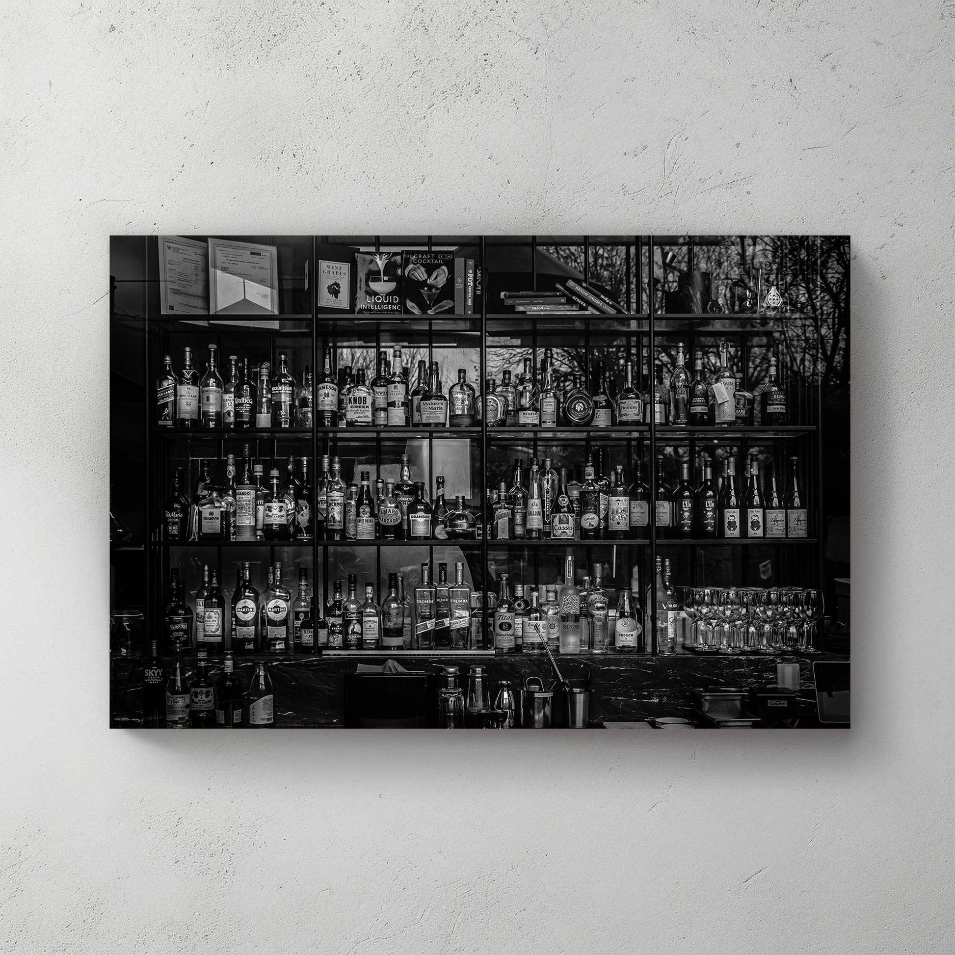 black and white bar scene with liquor bottles wall art