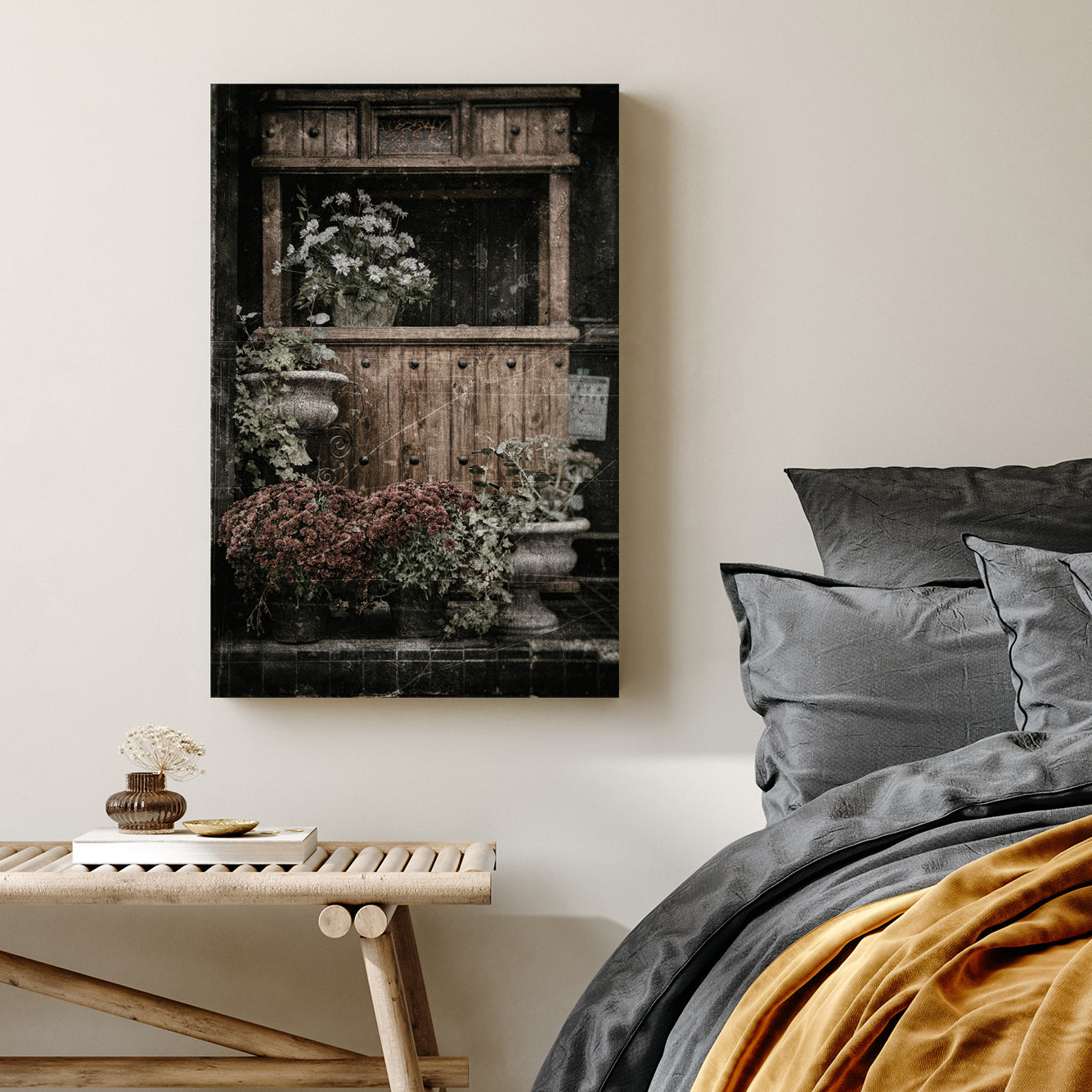 vintage buffet with flowers and rustic texture wall art