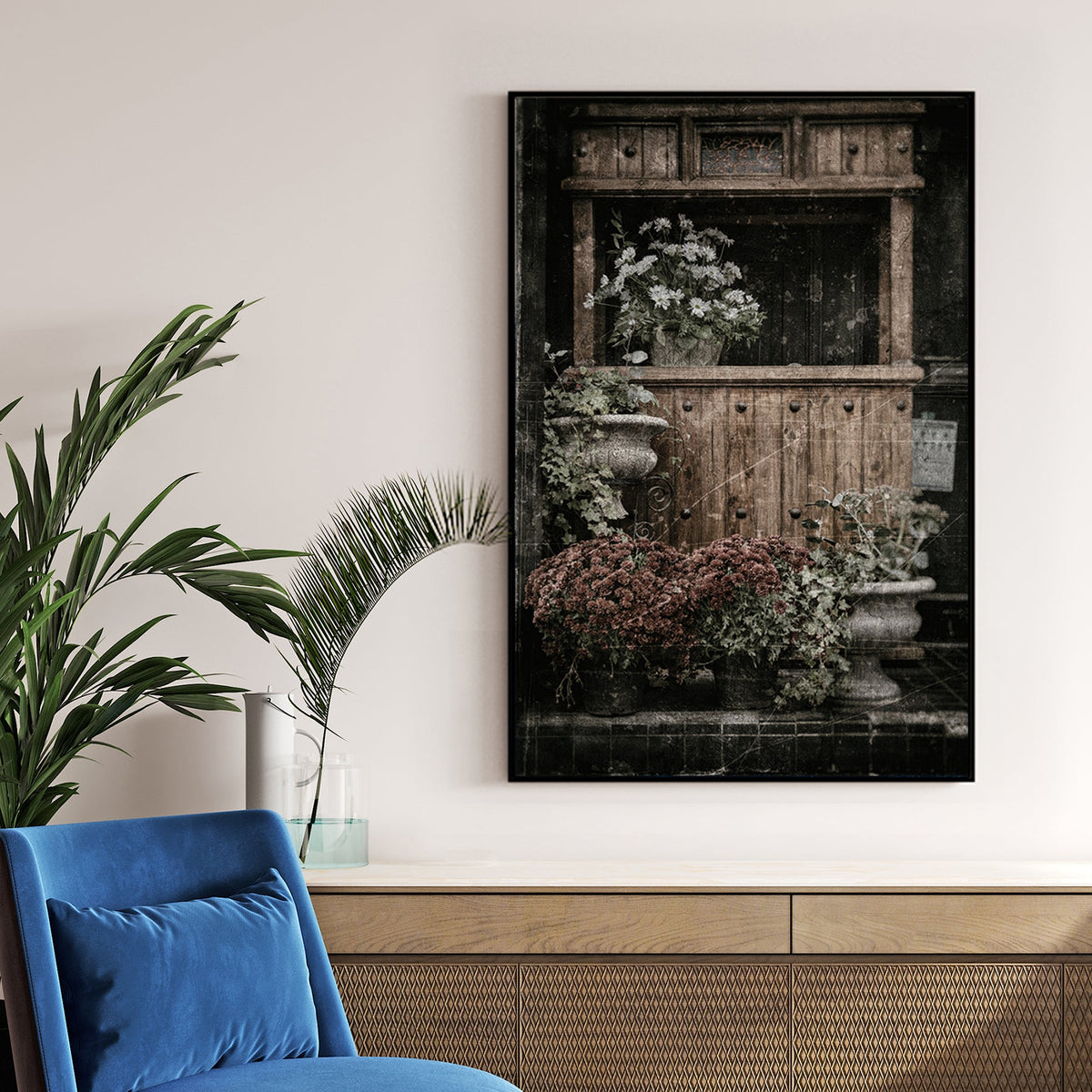 vintage buffet with flowers and rustic texture wall art