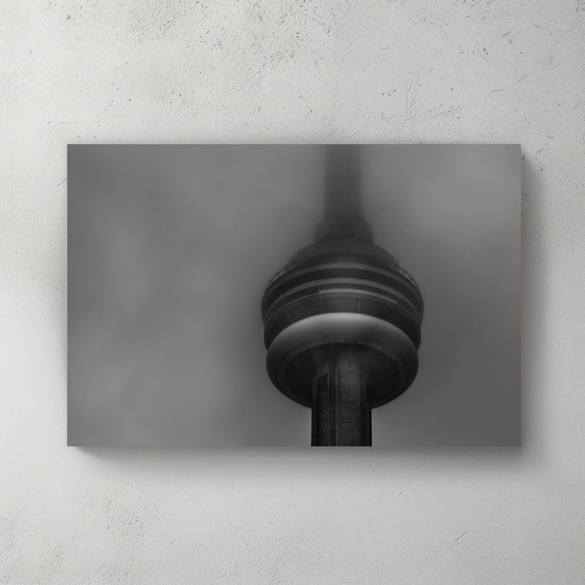 CN Tower in heavy fog black and white photo
