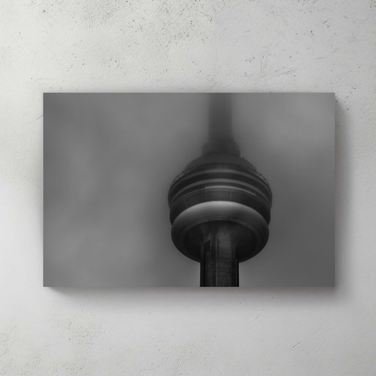CN Tower in heavy fog black and white photo