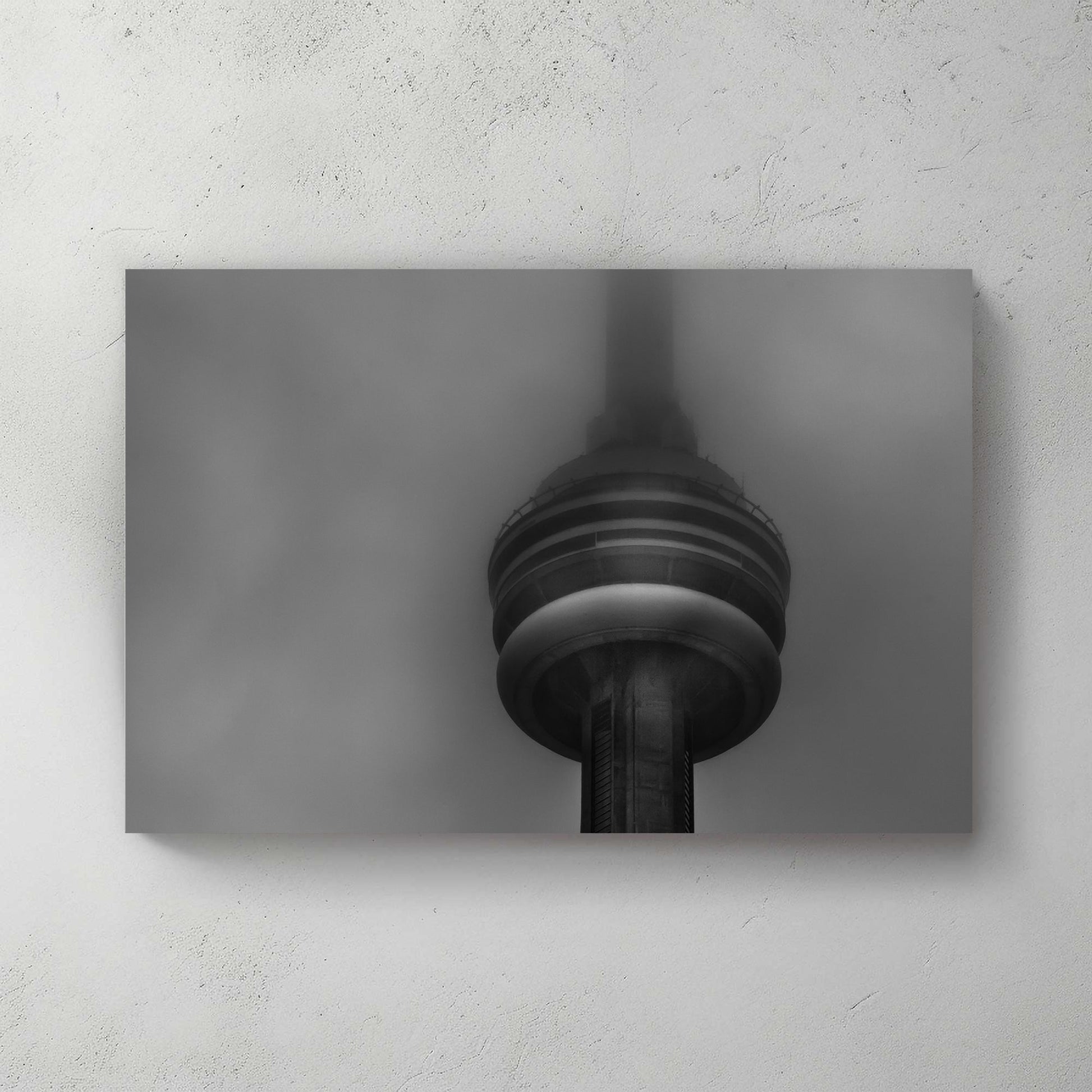 CN Tower in heavy fog black and white photo
