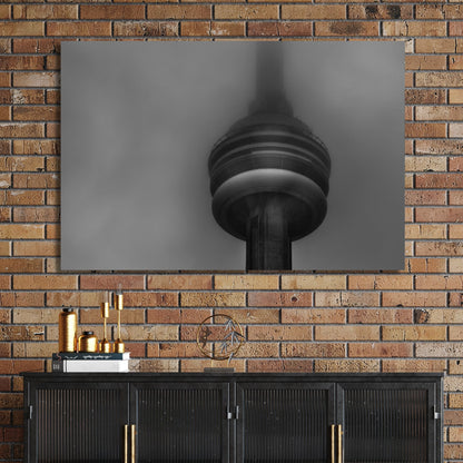 CN Tower in heavy fog black and white photo