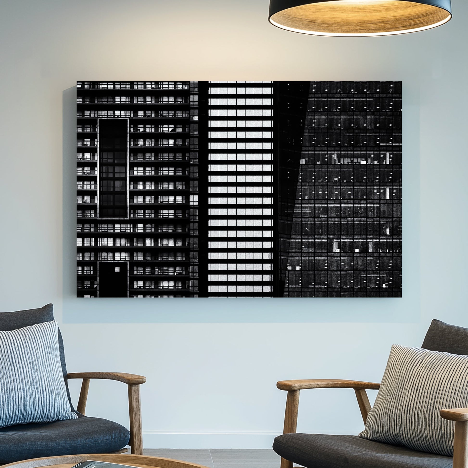 black and white closeup of modern city buildings with repeating windows and geometric patterns