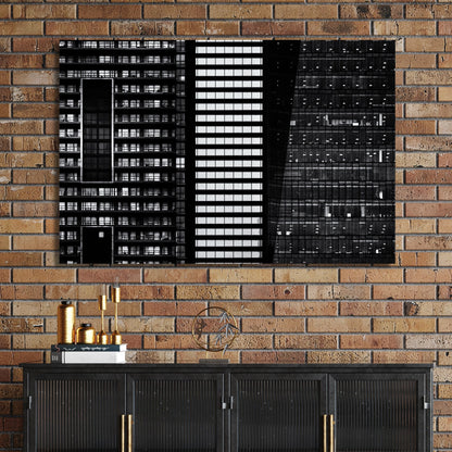 black and white closeup of modern city buildings with repeating windows and geometric patterns