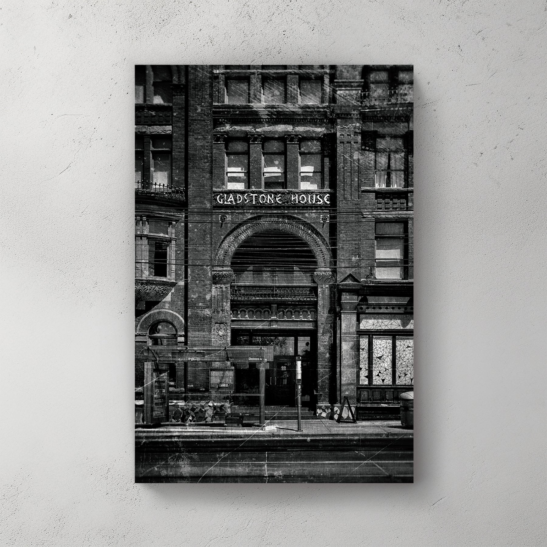vintage black and white photo of Gladstone Hotel entrance in Toronto with distressed old film effect