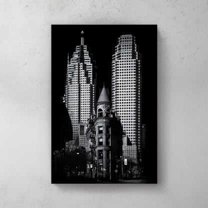 black and white image of Toronto Flatiron building with downtown skyscrapers in background