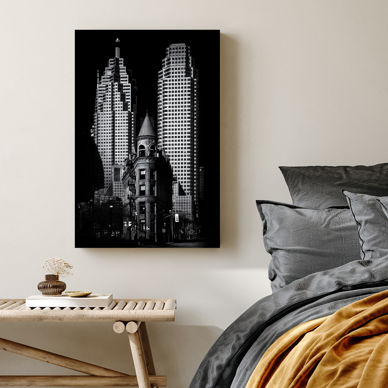 black and white image of Toronto Flatiron building with downtown skyscrapers in background