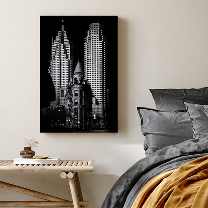black and white image of Toronto Flatiron building with downtown skyscrapers in background
