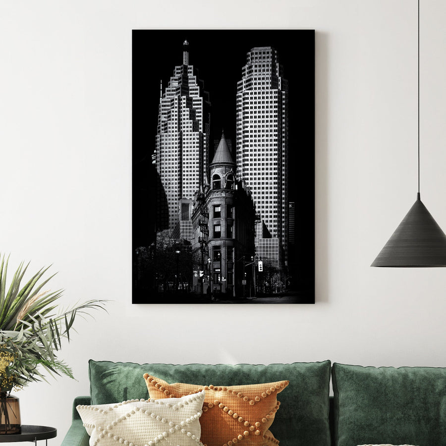 black and white image of Toronto Flatiron building with downtown skyscrapers in background