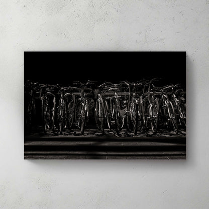 black and white urban bicycle rack wall art in dramatic shadows