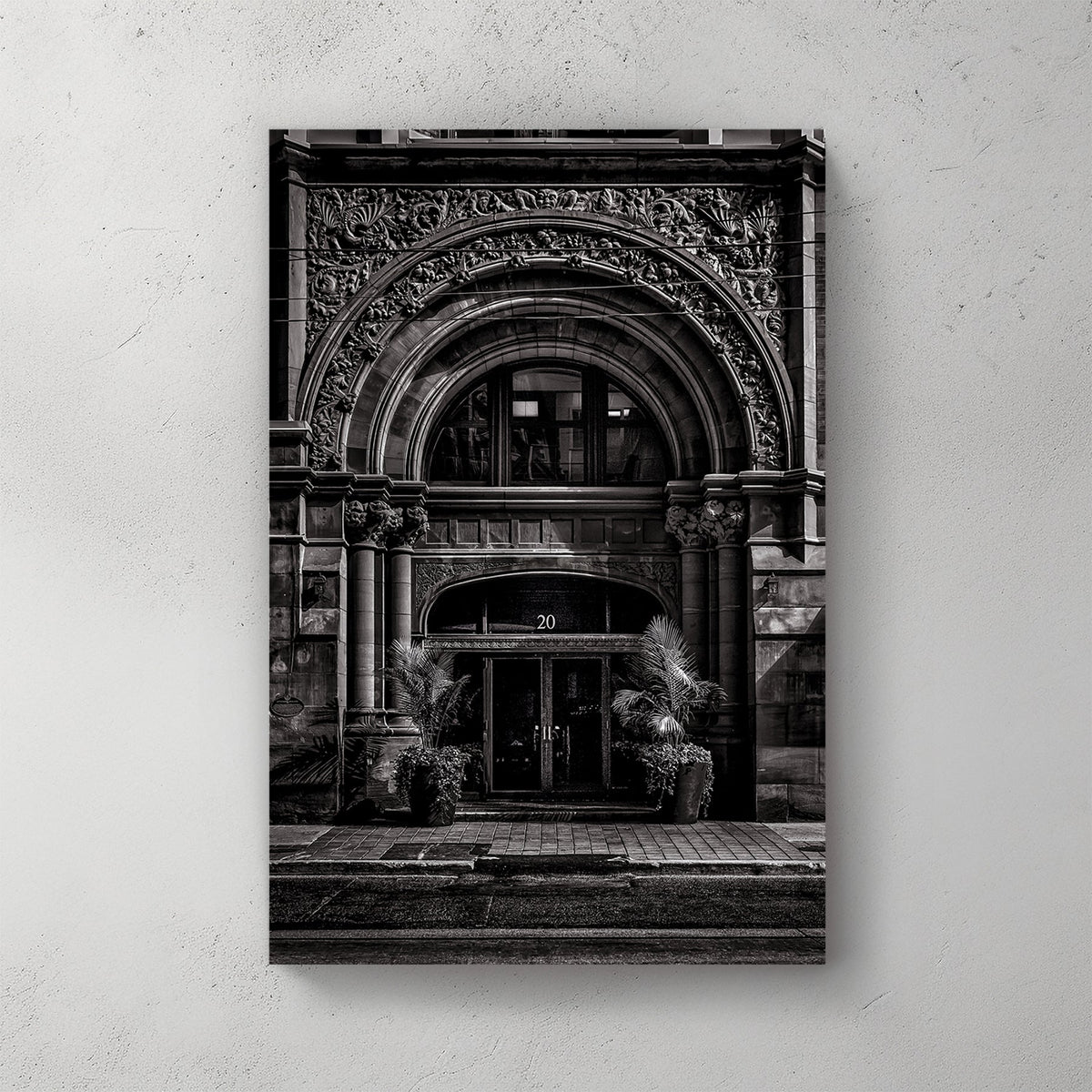 ornate Toronto stone building entrance wall art in black and white