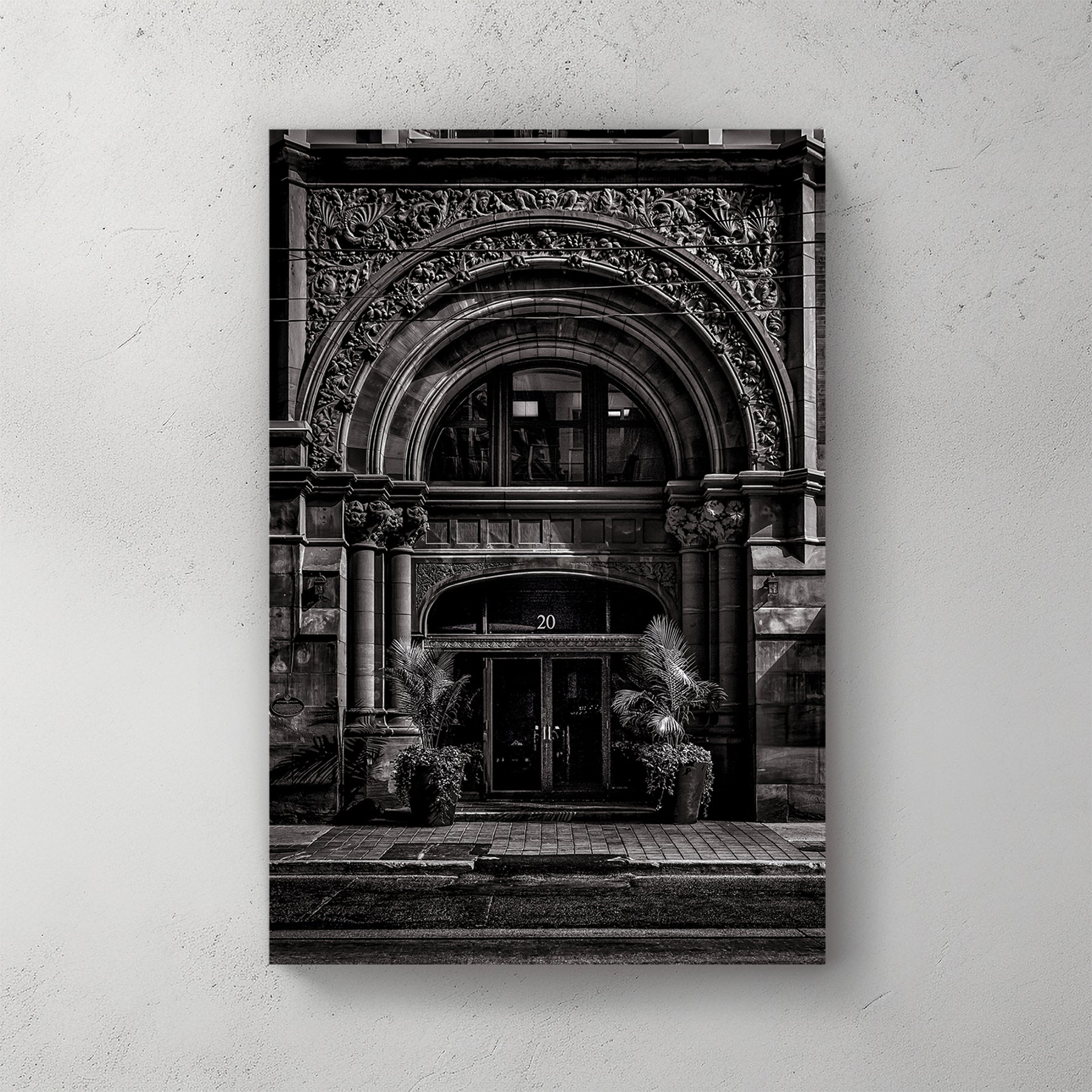ornate Toronto stone building entrance wall art in black and white