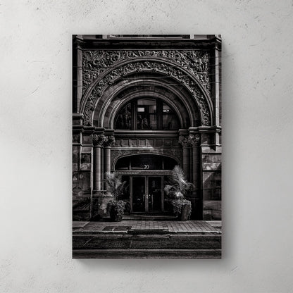 ornate Toronto stone building entrance wall art in black and white