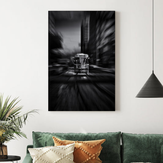 black and white photo of Toronto 512 streetcar with motion blur in city