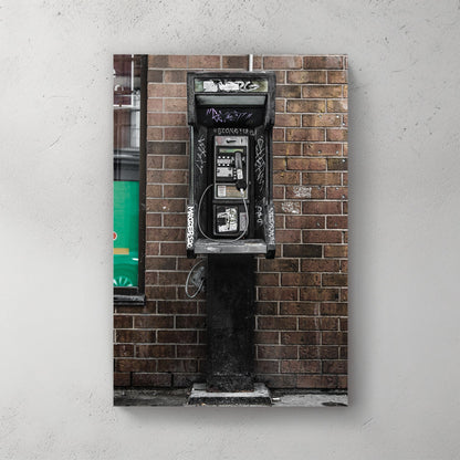 gritty urban phone booth wall art with graffiti and brick wall