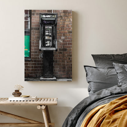 gritty urban phone booth wall art with graffiti and brick wall